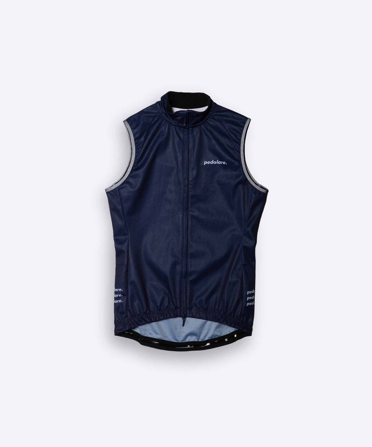 Male men’s cyclist wearing Pedalare’s high-performance navy, blue cycling vest, layered over a navy long sleeve jersey and black bib shorts. Side profile studio shot showcasing the vest’s aerodynamic fit and premium detailing. Lightweight, windproof men’s cycling vest ideal for cool weather rides. Designed by Perth cycling brand Pedalare for performance, comfort, and style. Aero cycling gear for dedicated road cyclists.