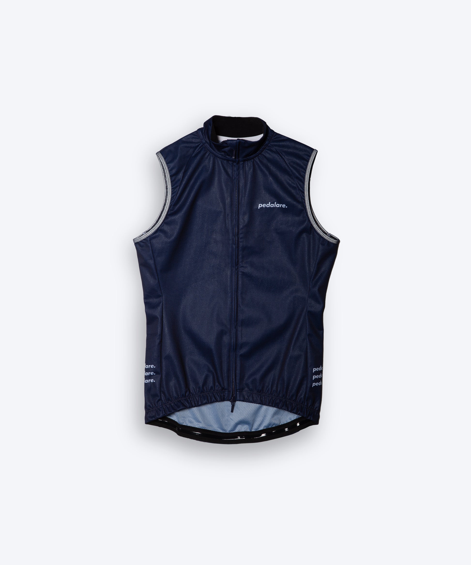 Male men’s cyclist wearing Pedalare’s high-performance navy, blue cycling vest, layered over a navy long sleeve jersey and black bib shorts. Side profile studio shot showcasing the vest’s aerodynamic fit and premium detailing. Lightweight, windproof men’s cycling vest ideal for cool weather rides. Designed by Perth cycling brand Pedalare for performance, comfort, and style. Aero cycling gear for dedicated road cyclists.